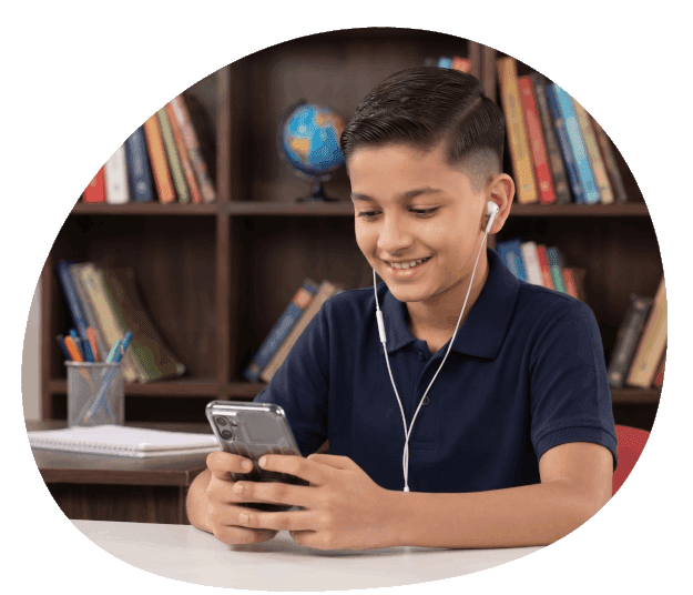 A school student smiling while studying on their phone